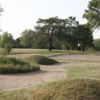 A view of green guarded by bunkers at Hartford Golf Club