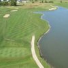 Aerial view of green #11 and fairway surrounded by water at Kestrel Ridge Golf Club