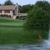 A view of green at Country Club Estates with Pro Shop in background