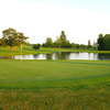 A view of green surrounded by water at Rock River Hills Golf Club