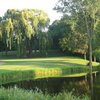 A view of green surrounded by water at Olde Highlander Golf Club